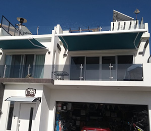 pacific-blinds-exterior-brazo-articulado